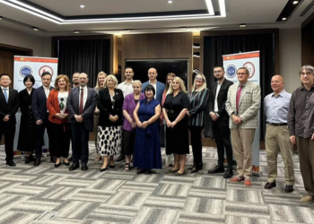 Associate Professor Sajić at a conference on relatio...